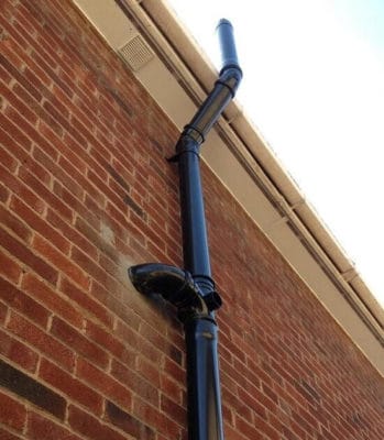 picture of soil pipes installed on the side of a house