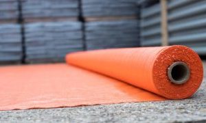 picture of a roll of orange geotextile membrane
