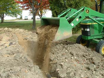 picture image of backfilling a trench