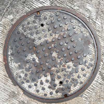 image of steel manhole cover for load classes for channel drains, gully grates and everything in between blog
