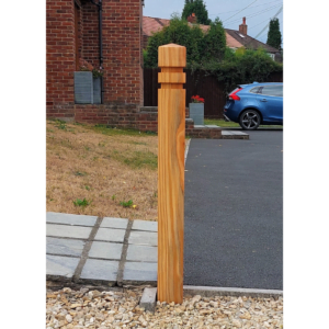 photograph of seaton 94 timber bollard on driveway - larch