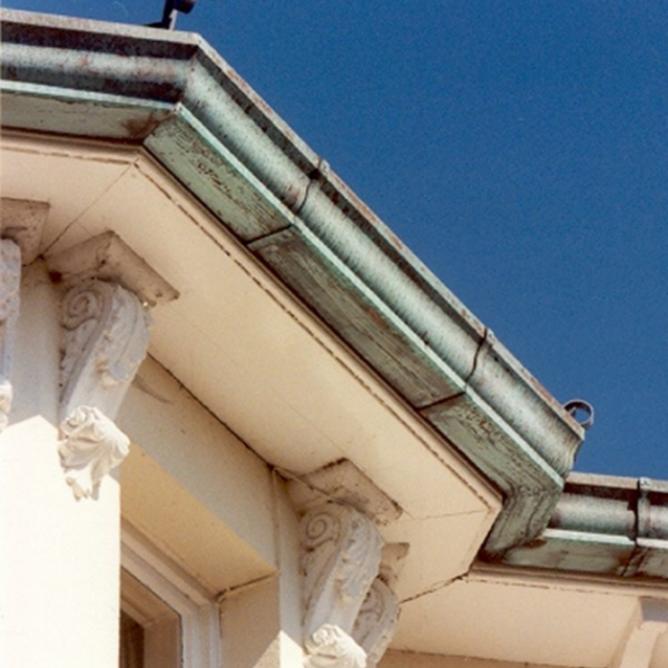 photo showing copper guttering aged to verdigris