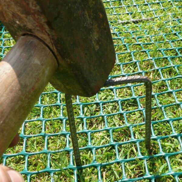 gallery image of turf reinforcement mesh secured with pins