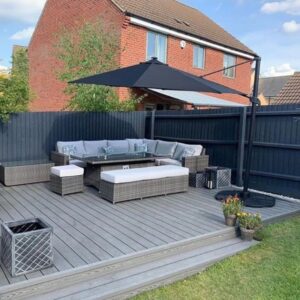 product image of hyperion explorer stone grey composite decking installaed in garden